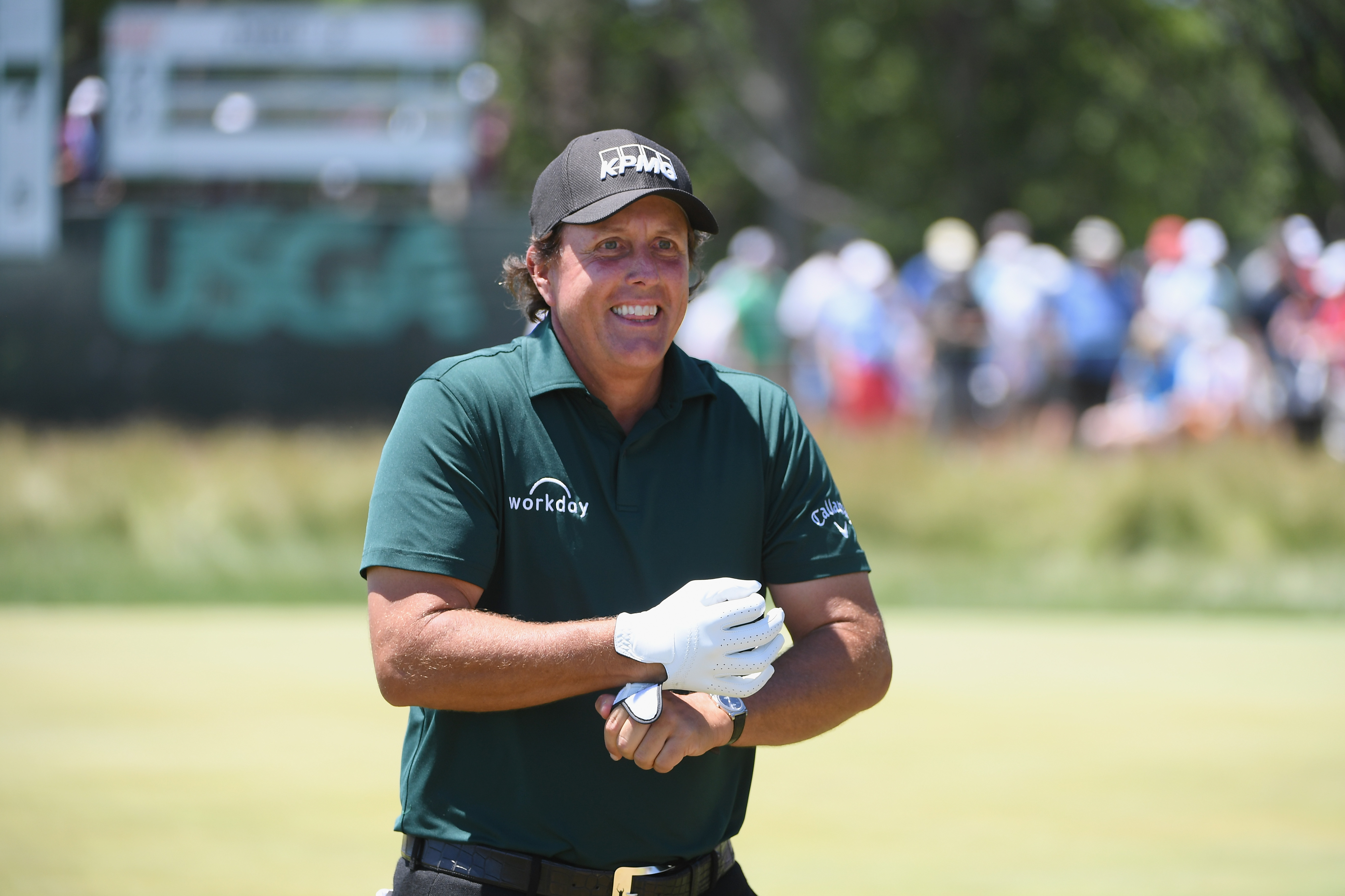 WATCH: Phil Mickelson takes 2-shot penalty for hitting a moving golf ball!