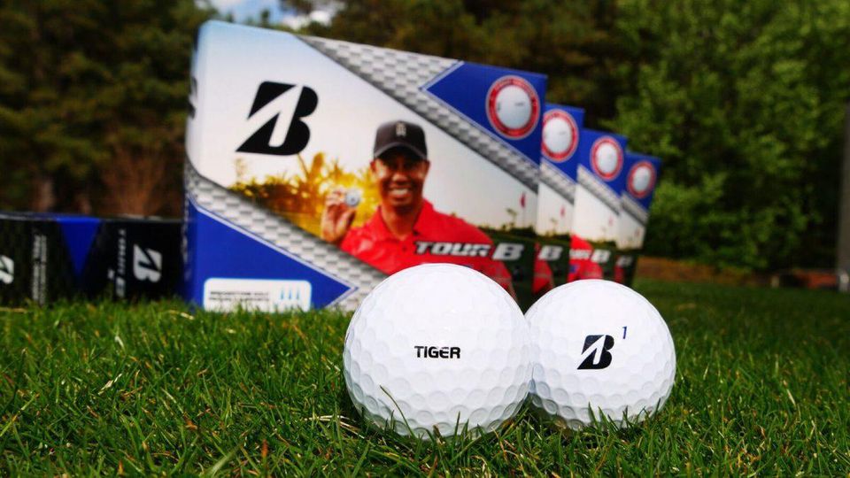 #13 - How does Tiger Woods mark his golf ball