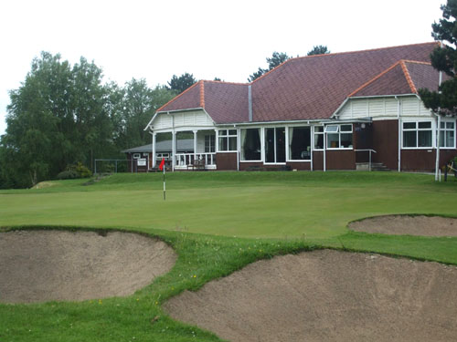 Aberystwyth's clubhouse and 18th green