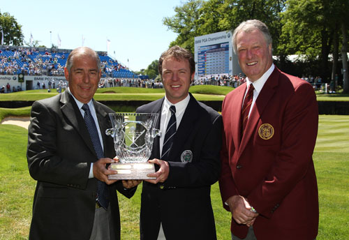 Jonathan Lawrecne receives the award from Warren Sunderland (left) and PGA Captain Jim Farmer