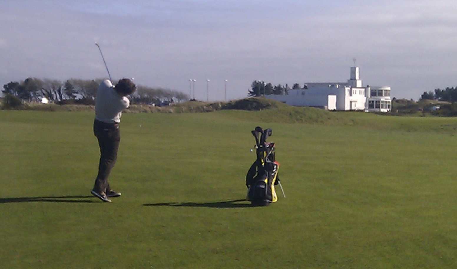 Adam makes his approach at the 9th - one of the best holes in British golf