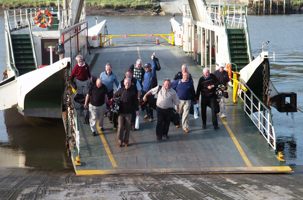 Golfers disembarking from the ferry at Waterford Castle golf course