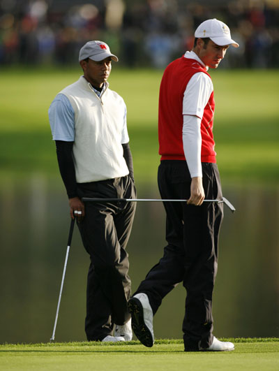 Tiger Woods and Ross Fisher both took advantage of clothing layers during the cool and damp Ryder Cup last year