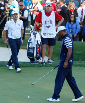 Woods’ short missed putt at 18 ensured Europe won the Ryder Cup outright