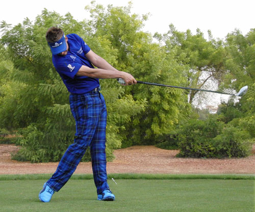 Ian Poulter shows a full extension...