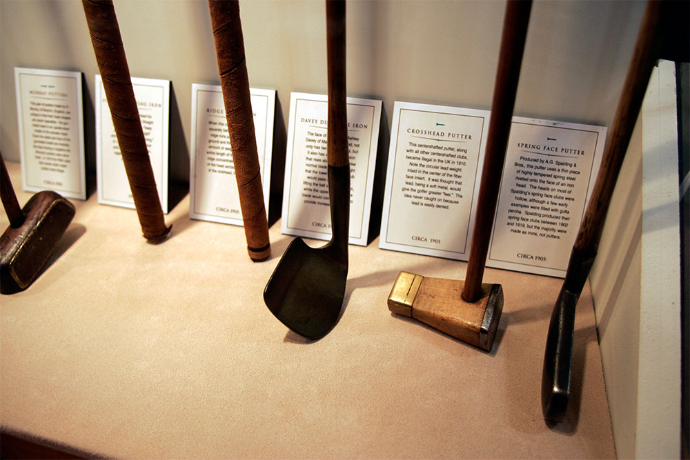 Antique clubs on display - putters have come a long way!