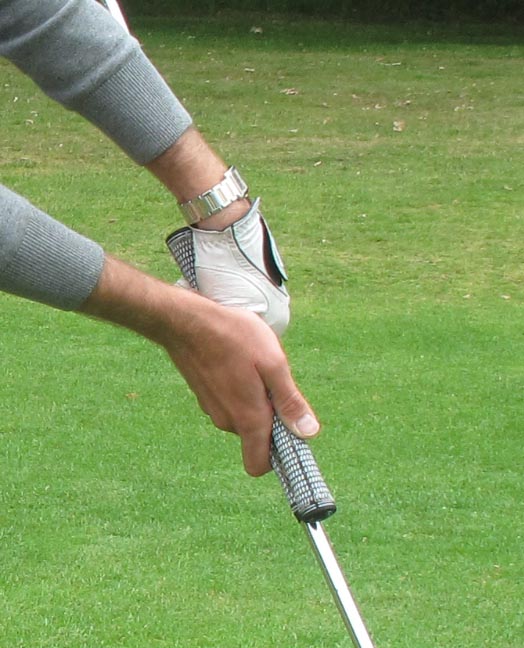 Put the two grips together and hold them using a standard grip