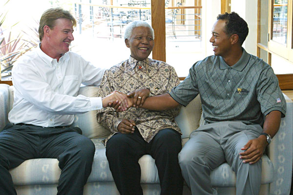 Ernie Els and Tiger Woods meeting Mandela at the 2003 Presidents Cup