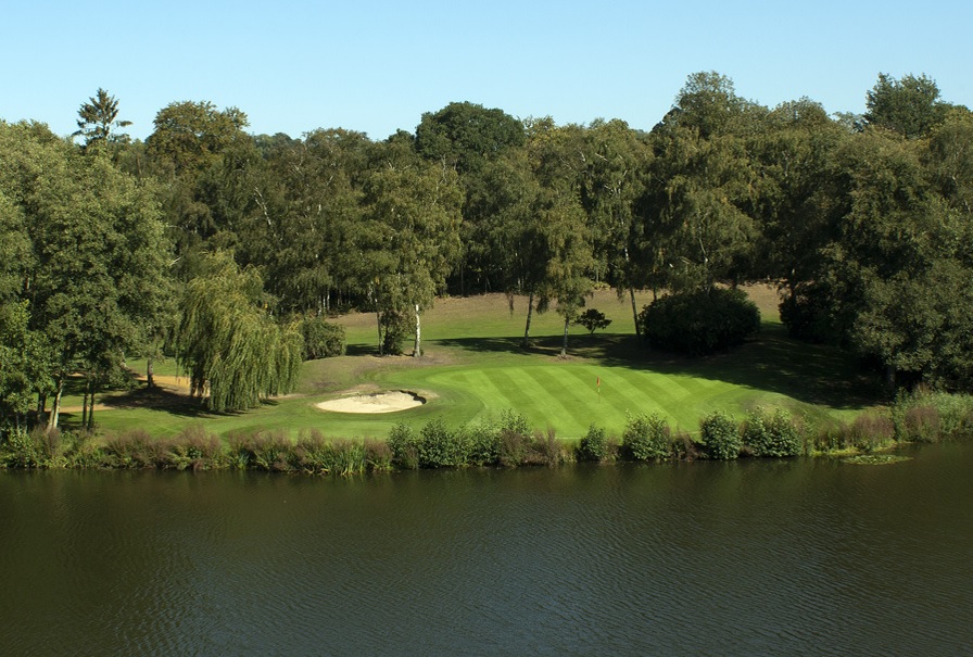 The par-three 17th hole across Silvermere's lake