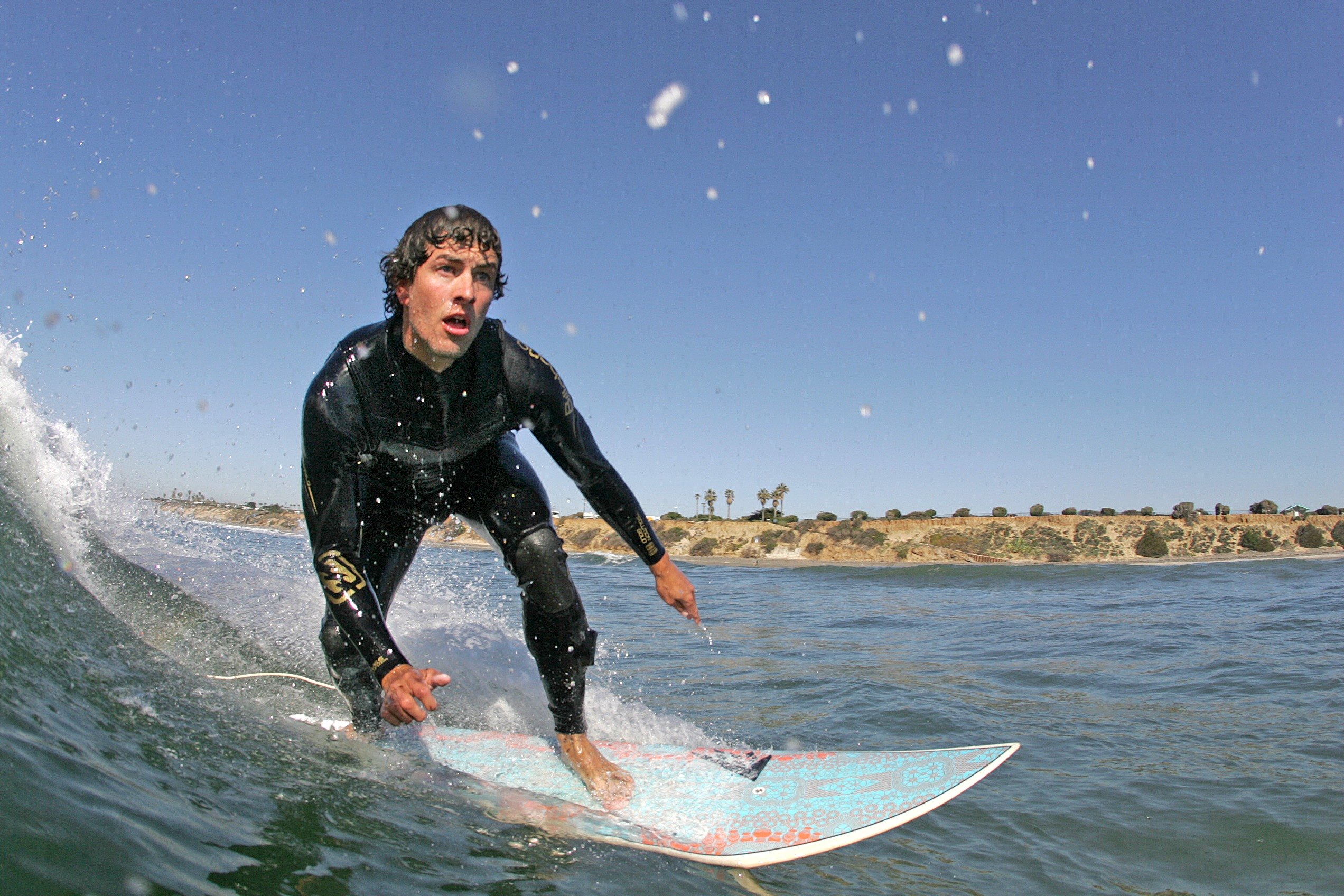 Scott had pro surfer Benji Weatherley as his bagman for a stint (Photo: Getty Images)