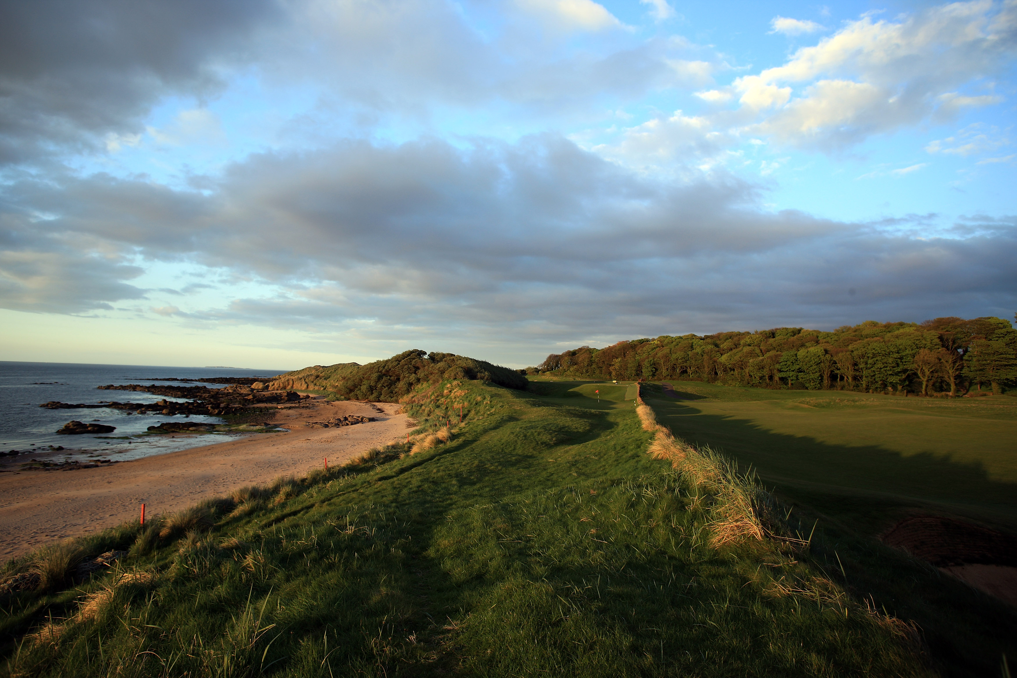 Stray off the tee, and you will find yourself playing off the beach (Photo: Getty Images)