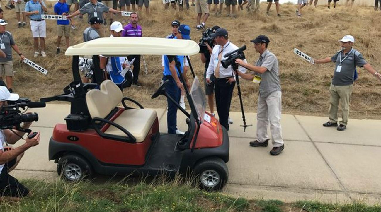 Steph Curry slam dunks opening drive into golf cart cup holder!