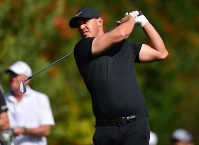 Brooks Koepka hits LEFT-HANDED BOMBS with Claude Harmon III