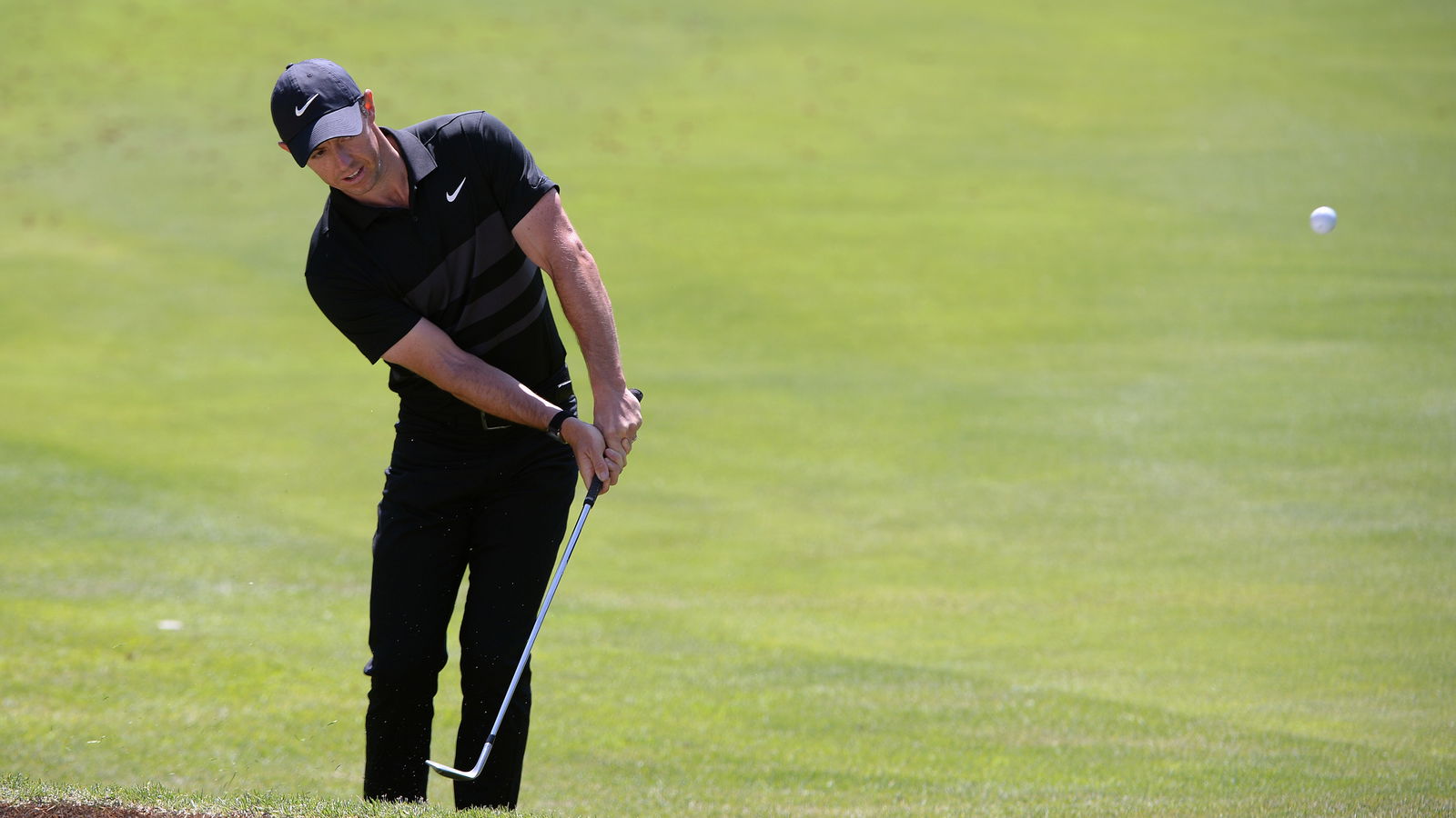 Rory McIlroy fluffs a chip during TaylorMade Driving Relief