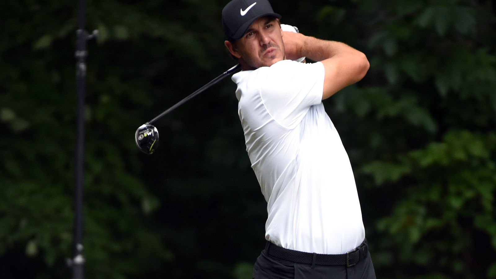 Brooks Koepka misses Wyndham cut, sends drive into someone's back lawn