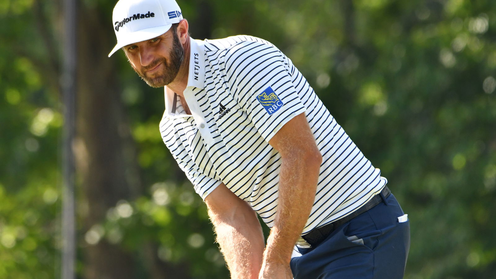 Dustin Johnson shoots 60 to take lead at The Northern Trust