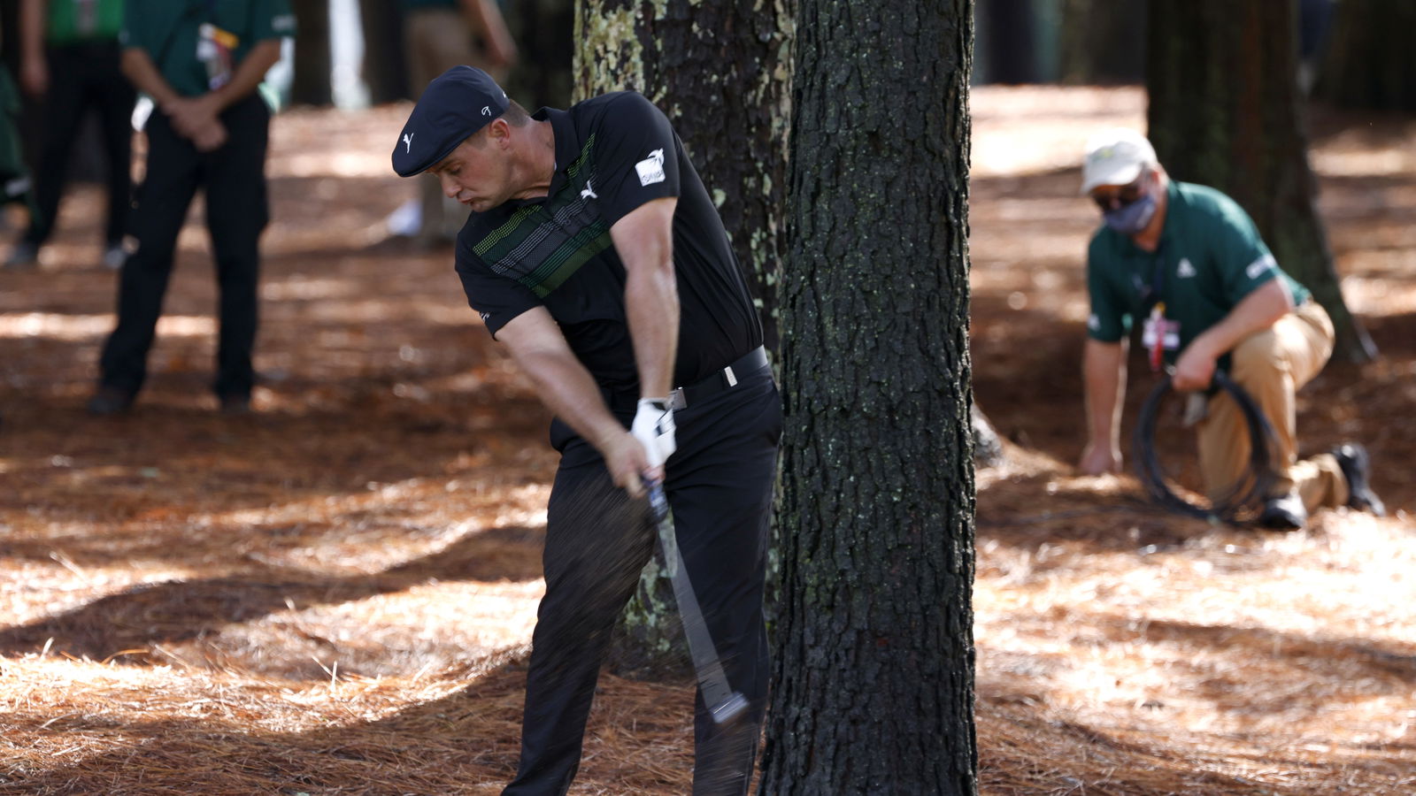 Bryson DeChambeau struggles off the tee but remains in Masters contention