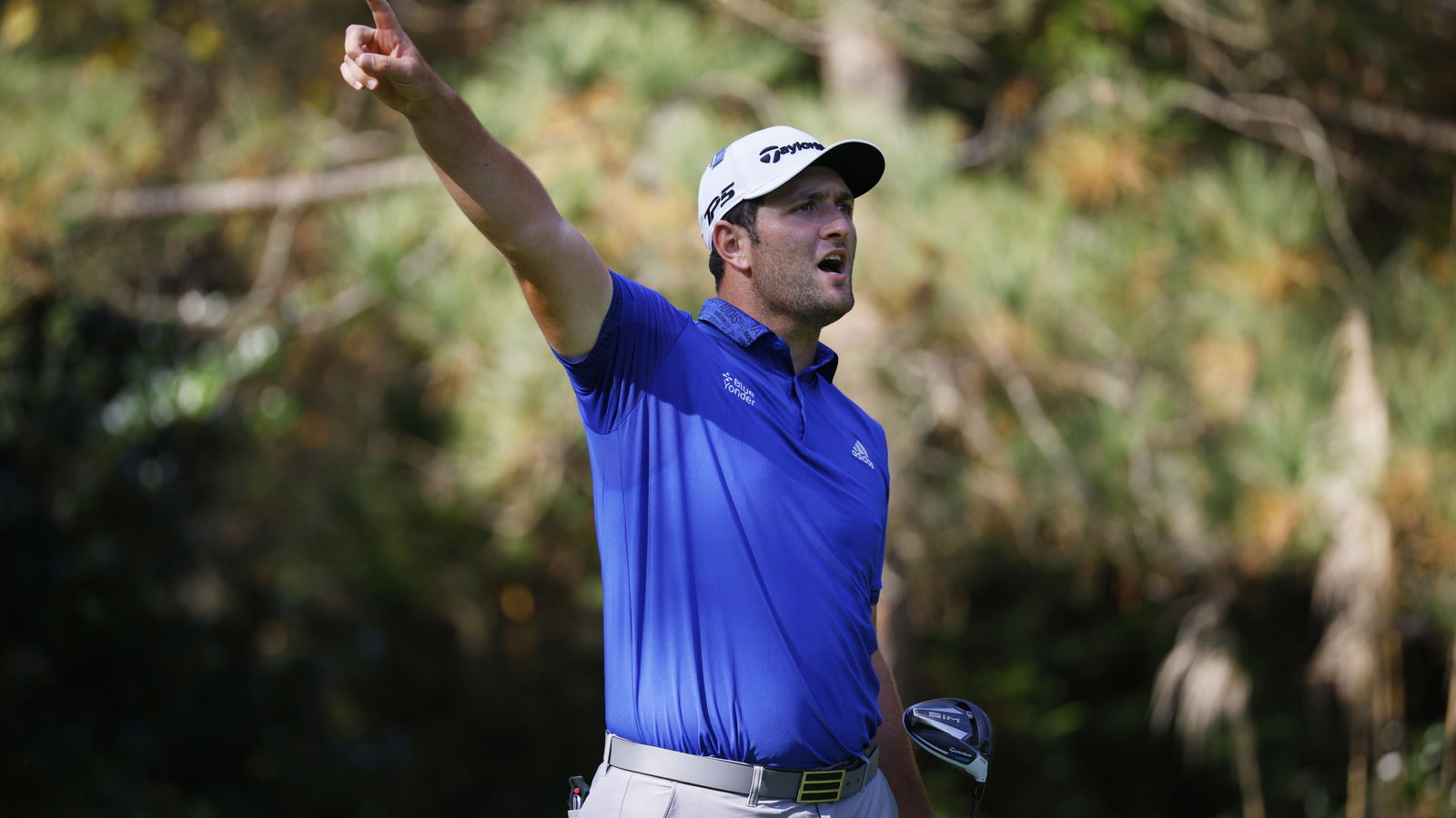 Jon Rahm follows DUFFED fairway wood with shot that hits the tree plum centre!