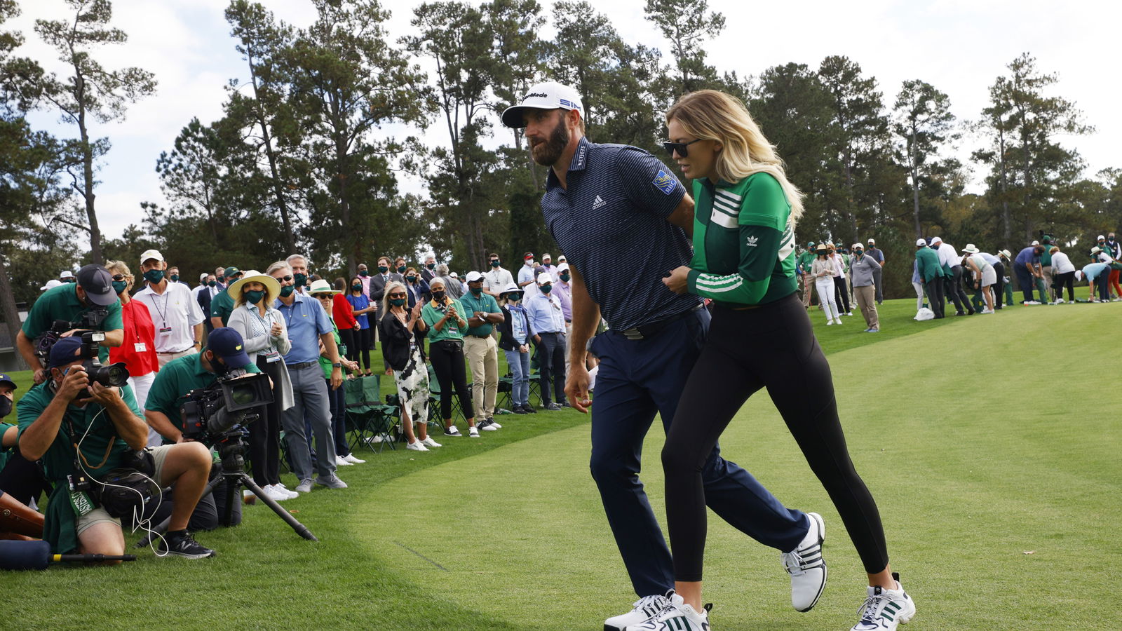 Paulina Gretzky plays golf with Dustin Johnson during birthday celebrations