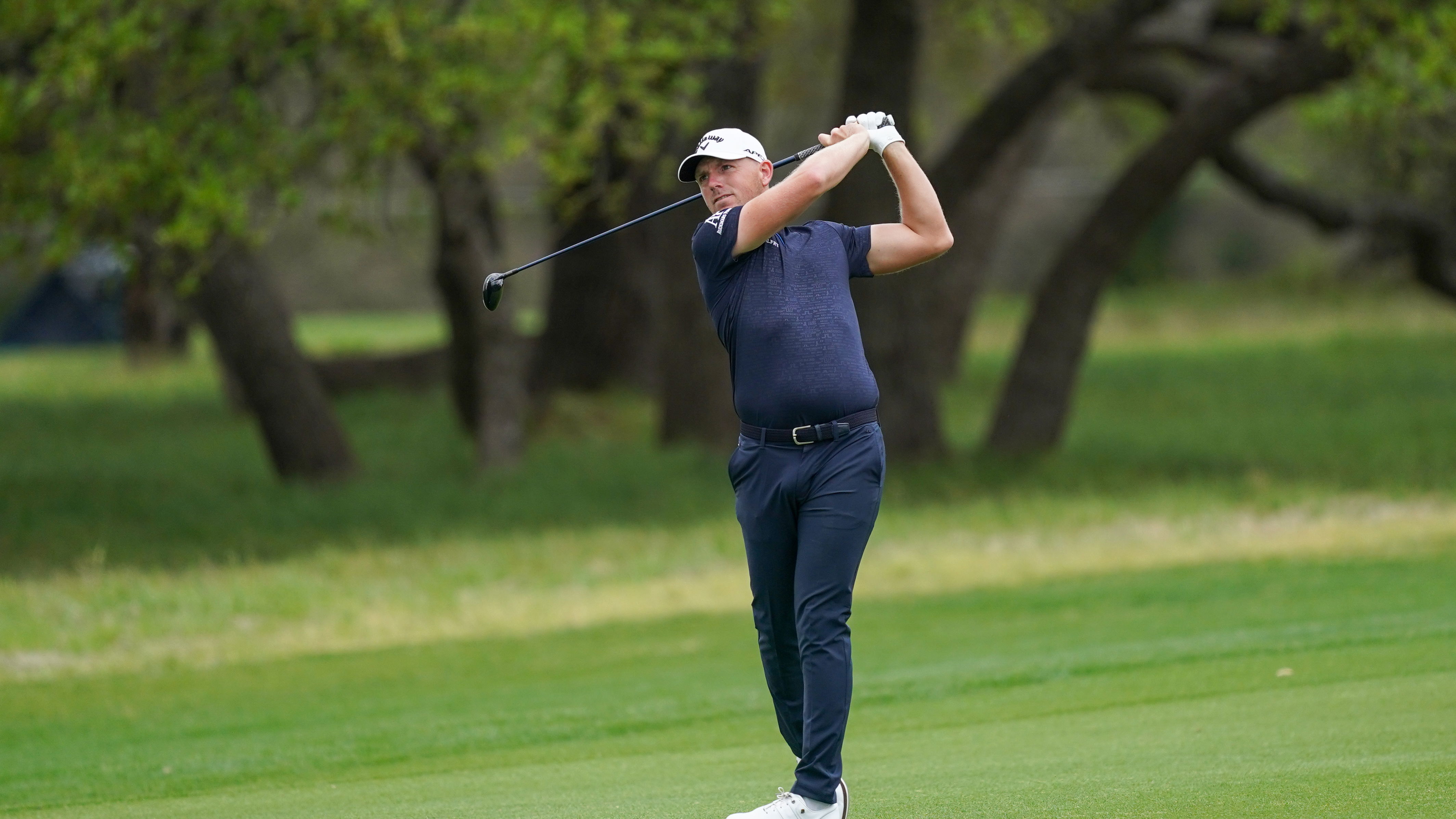 Golf fans react after a toddler CRIES during Matt Wallace's backswing