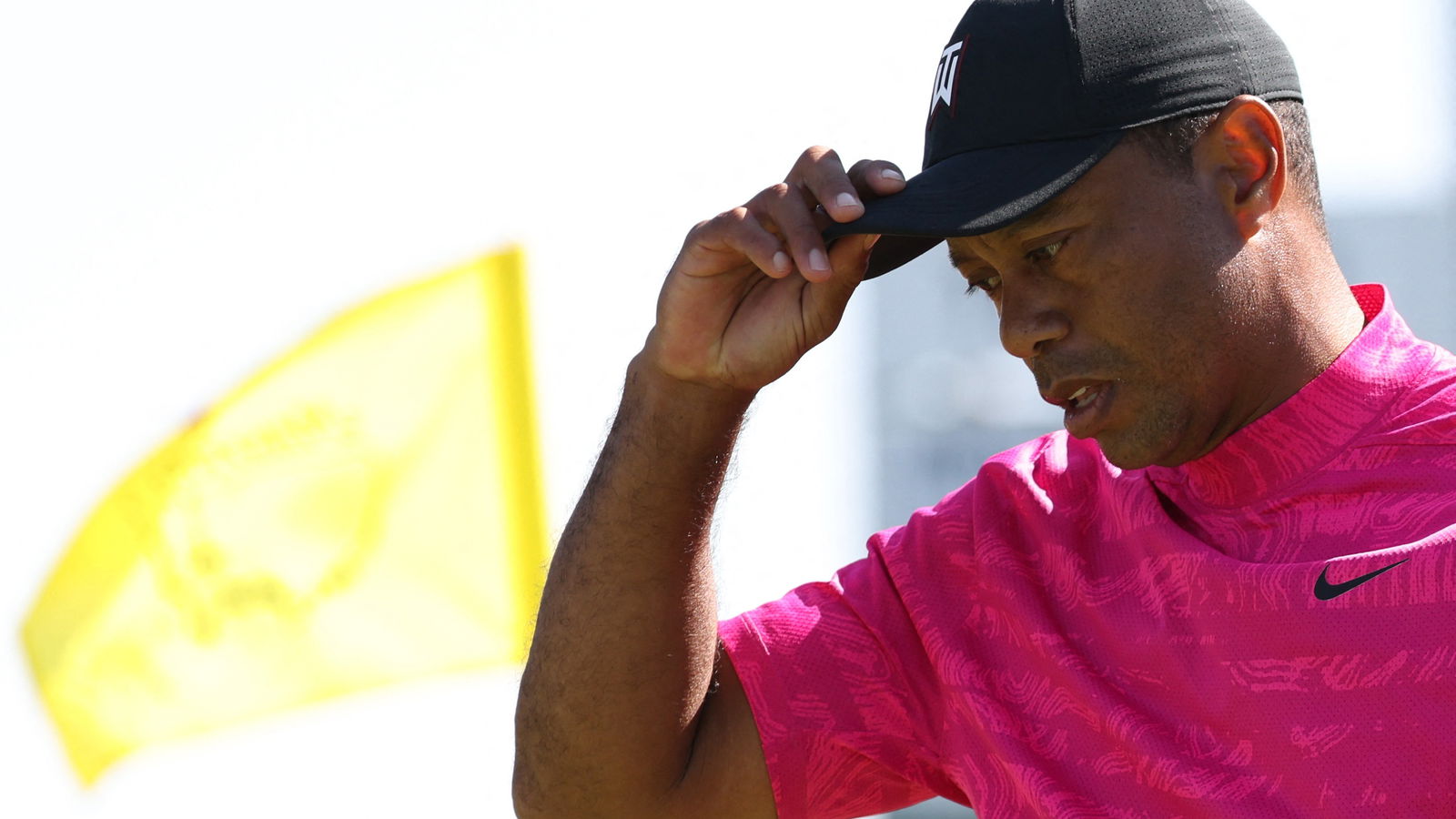 Golf fans react to Tiger Woods wearing a NEON PINK shirt at The Masters