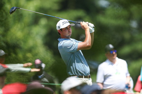 J.T. Poston goes low as Hoffmann avoids penalty for hitting his own hat