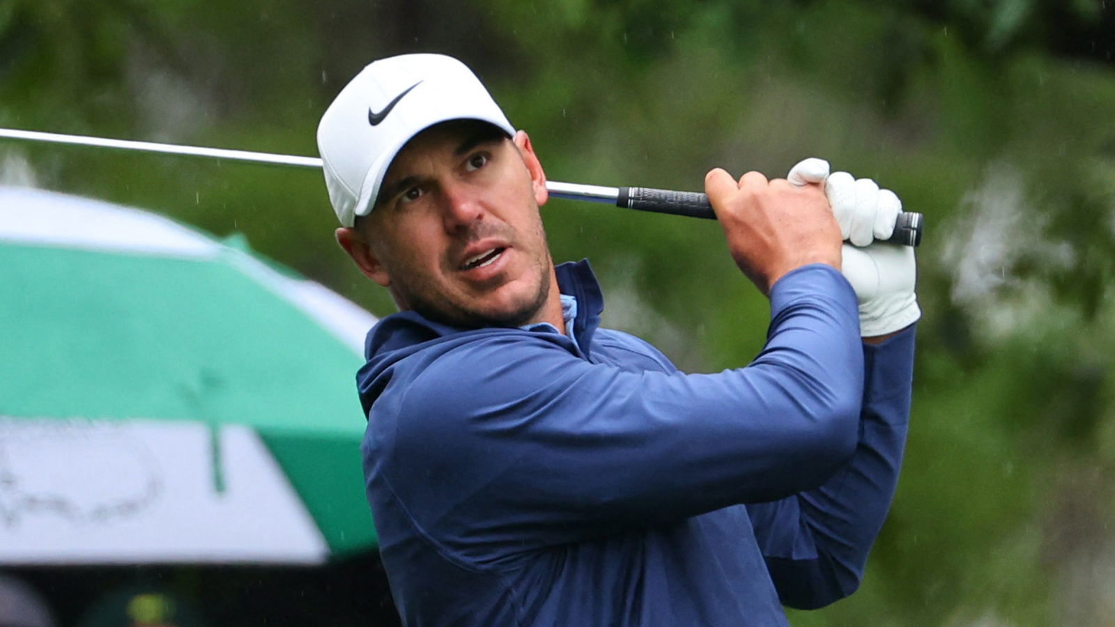 Brooks Koepka extends Masters lead as third round is suspended by weather