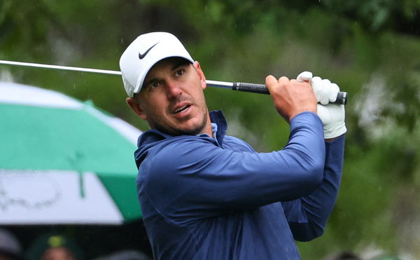 Brooks Koepka extends Masters lead as third round is suspended by weather