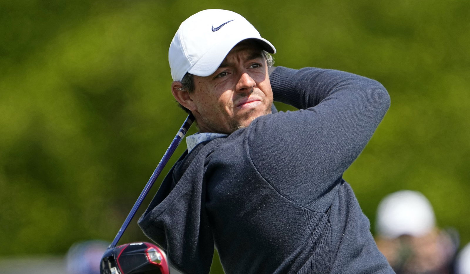 Padraig Harrington hits fan in head then takes out a wad of cash for him!