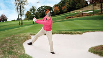 How to hit a downhill bunker shot