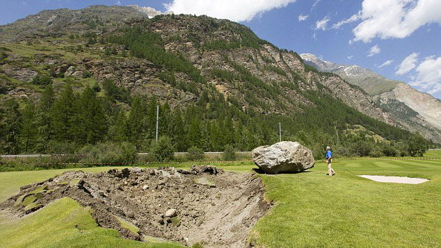 FORE! Rock falls 1,000 feet onto Swiss course