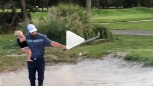 WATCH: Dad shows how to golf and parent at the same time!