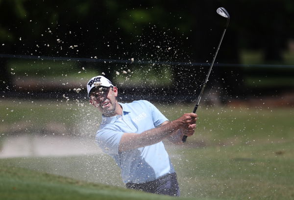 Charl Schwartzel shows exactly how to get out a plugged lie