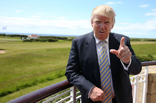 donald trump golf course vandalised by protest group