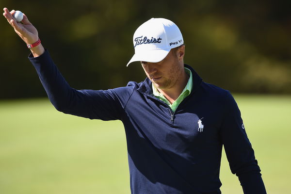 justin thomas chips ball into cup from 3 feet on the green