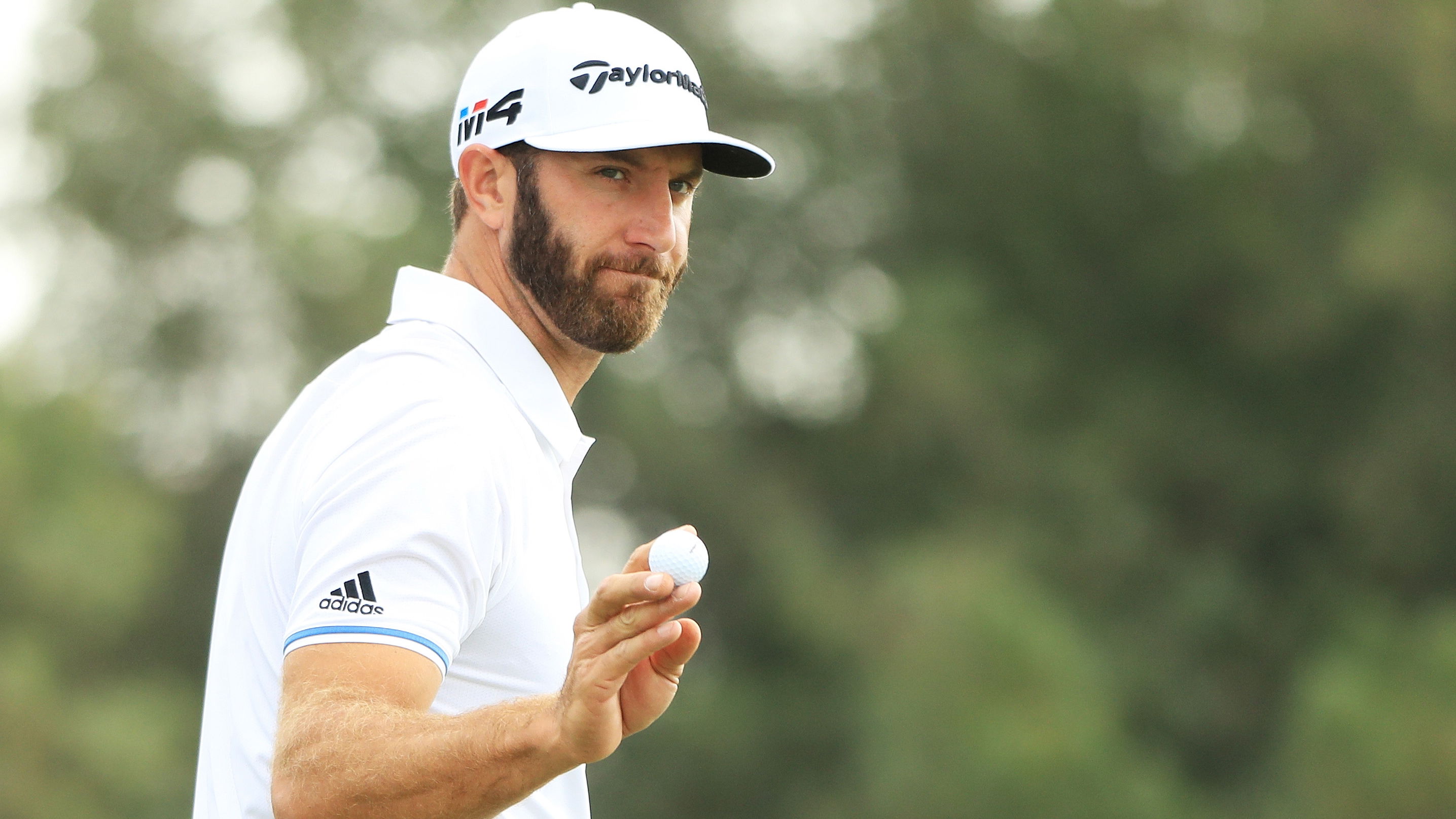 dustin johnson changes tune on golf ball distance debate