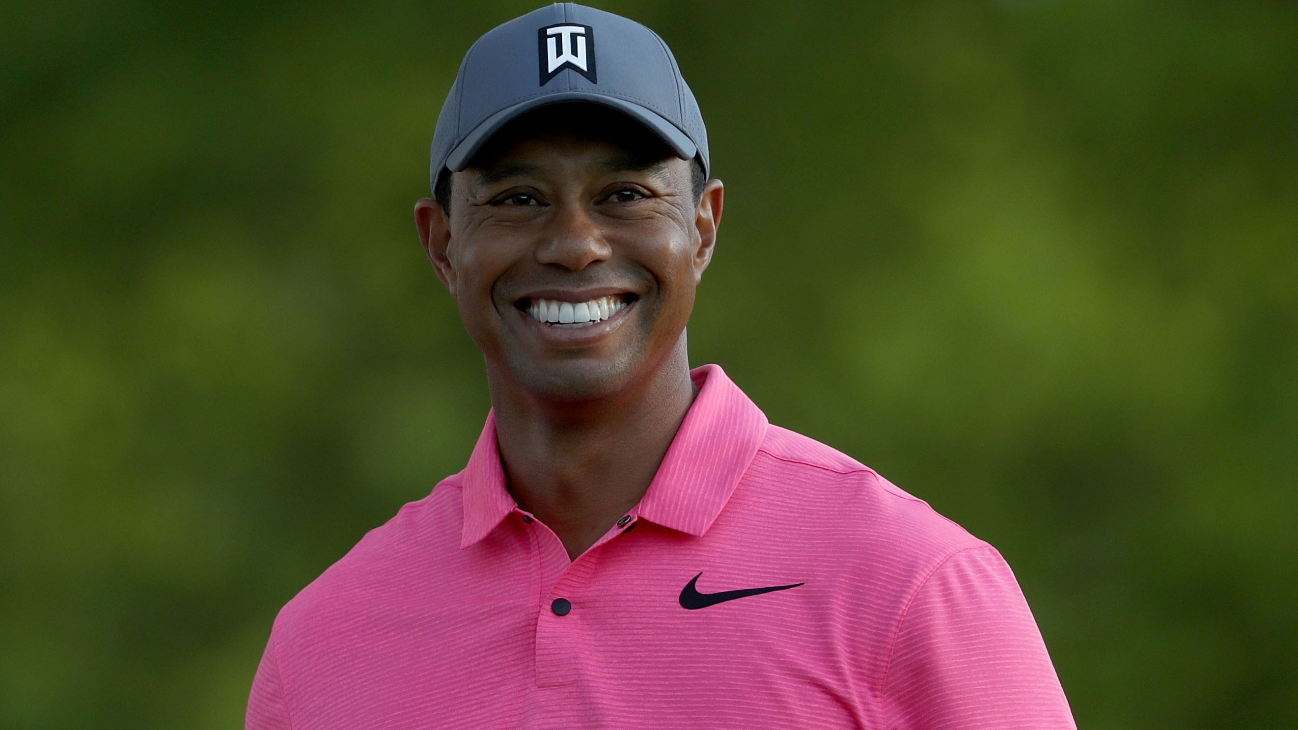 tiger woods hugs golf fan with special needs at wells fargo