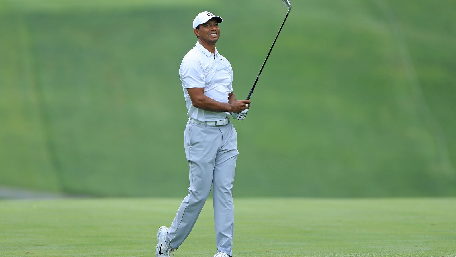 Tiger says his back is tight - but 'it's no biggy'