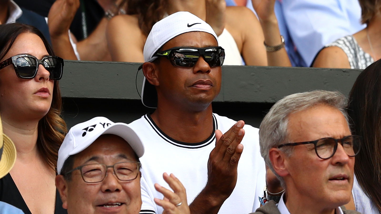 Woods expecting call from Serena Williams after Open near miss
