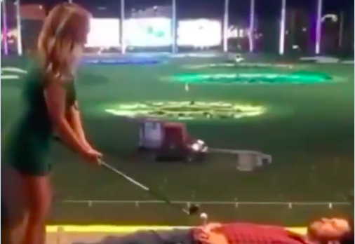 WATCH: Brave couple take on driving range challenge with PAINFUL ENDING