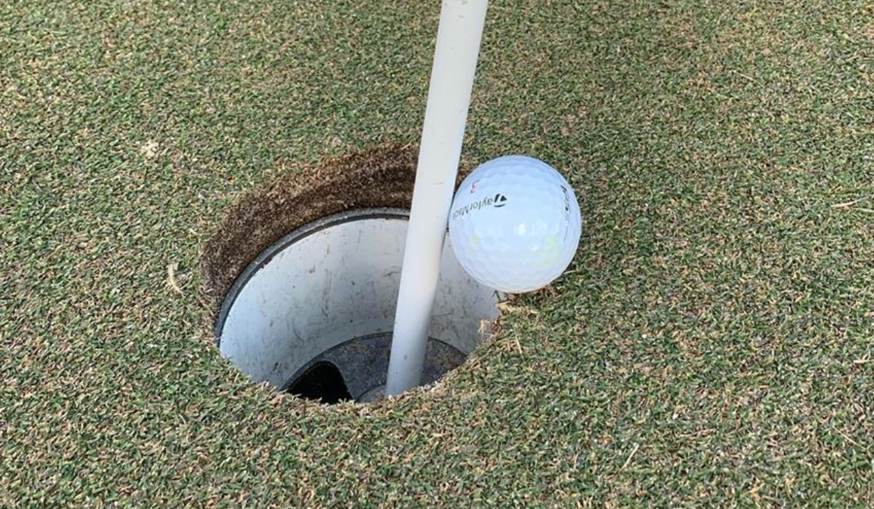 Golfer gets HOLE-IN-ONE using a PUTTER on 102-yard par-3!