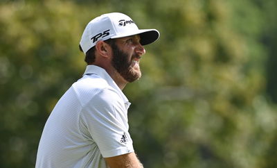 Dustin Johnson holds slender lead at Tour Championship