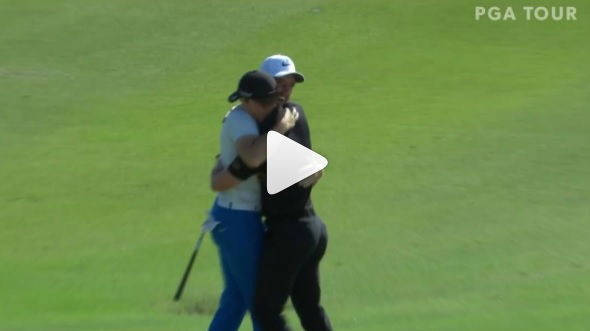 tommy fleetwood gives chris paisley a kiss after final hole eagle at zurich classic