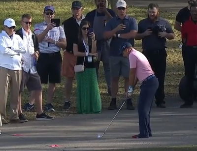 sergio garcia plays shot from cart path in his socks at wgc match play