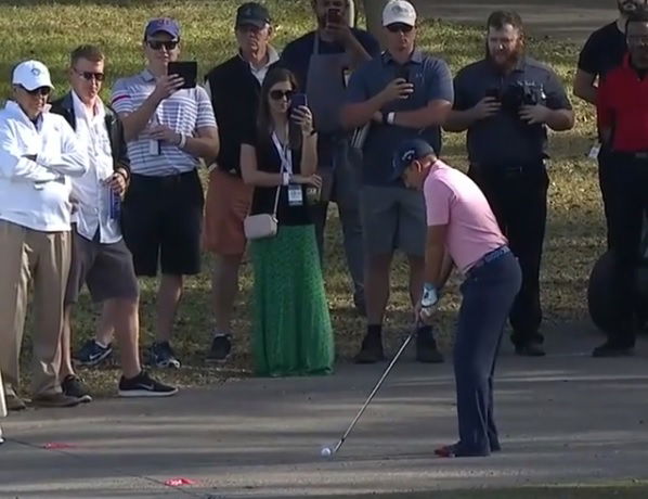 sergio garcia plays shot from cart path in his socks at wgc match play