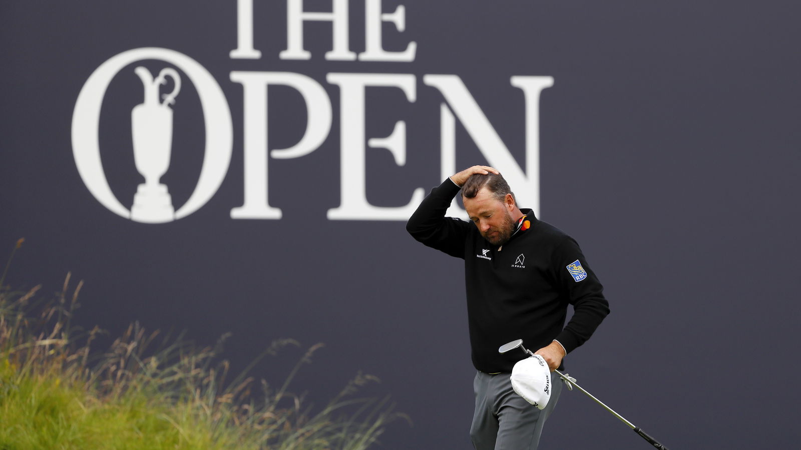Graeme McDowell takes anger out on golf bag at The Open