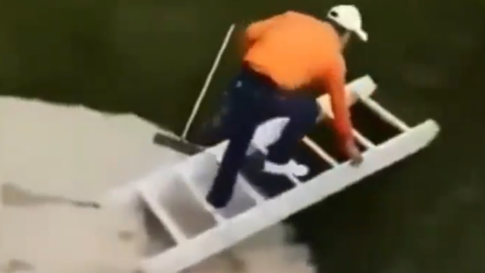 Golfer gets a LADDER to play his shot from the bunker