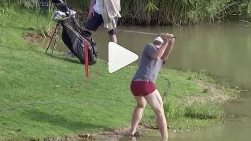 james heath plays golf shot from water in boxers