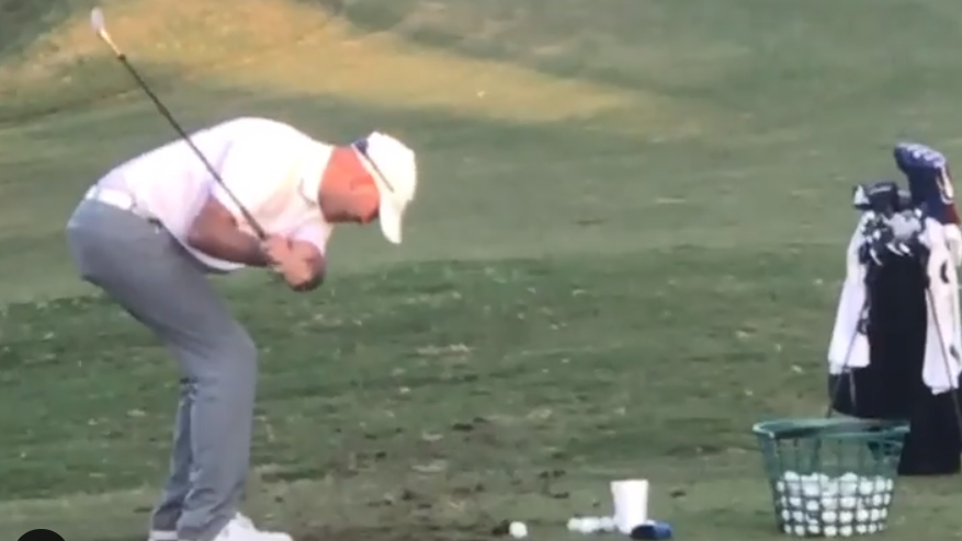 WATCH: We have no idea how THIS golf swing makes contact with a ball?!