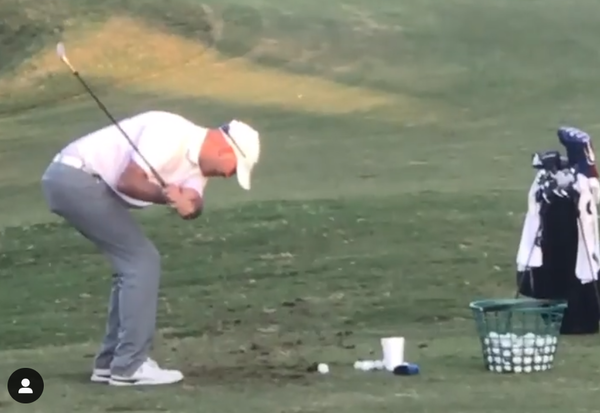 WATCH: We have no idea how THIS golf swing makes contact with a ball?!